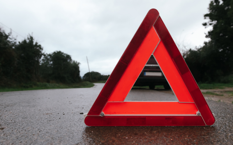 Hazard warning triangle placed on the road